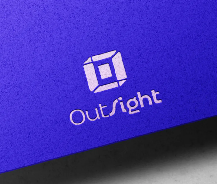 OutSight brand identity design, embossed logo on cobalt blue